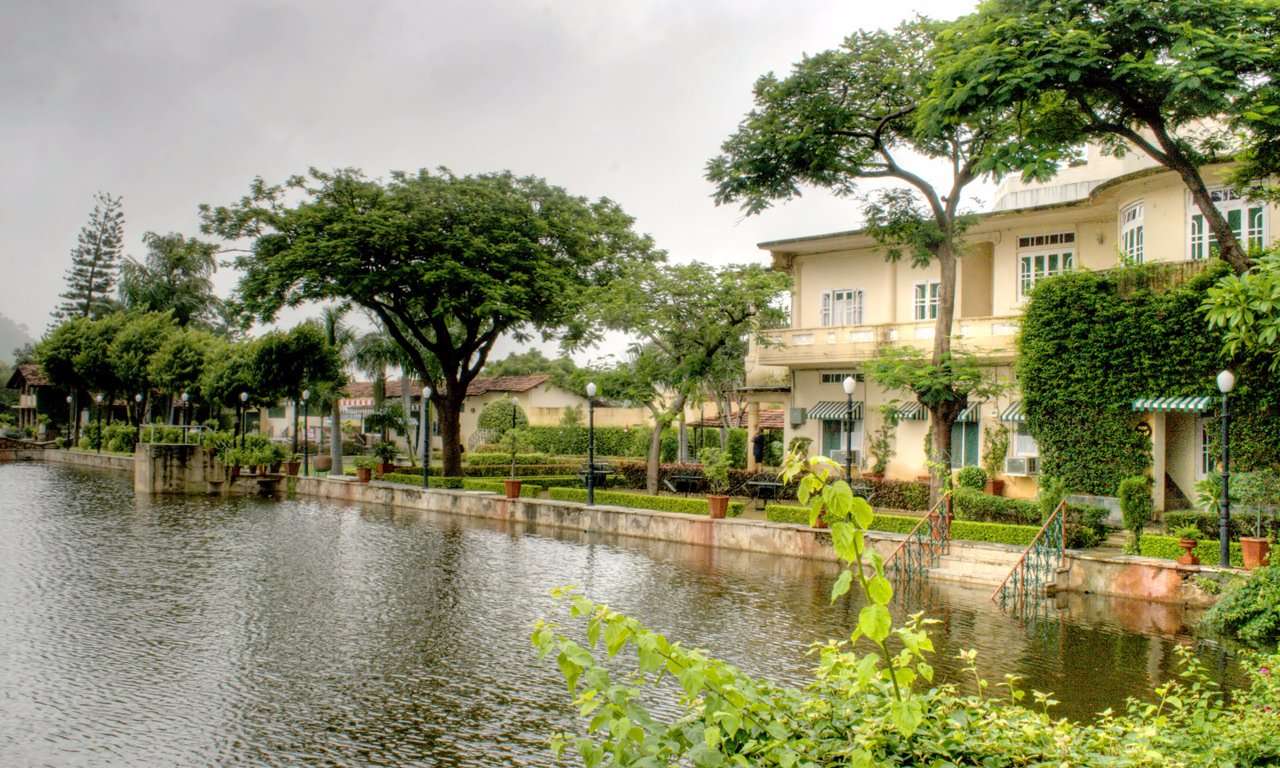 Exterior view of the resort with lake
