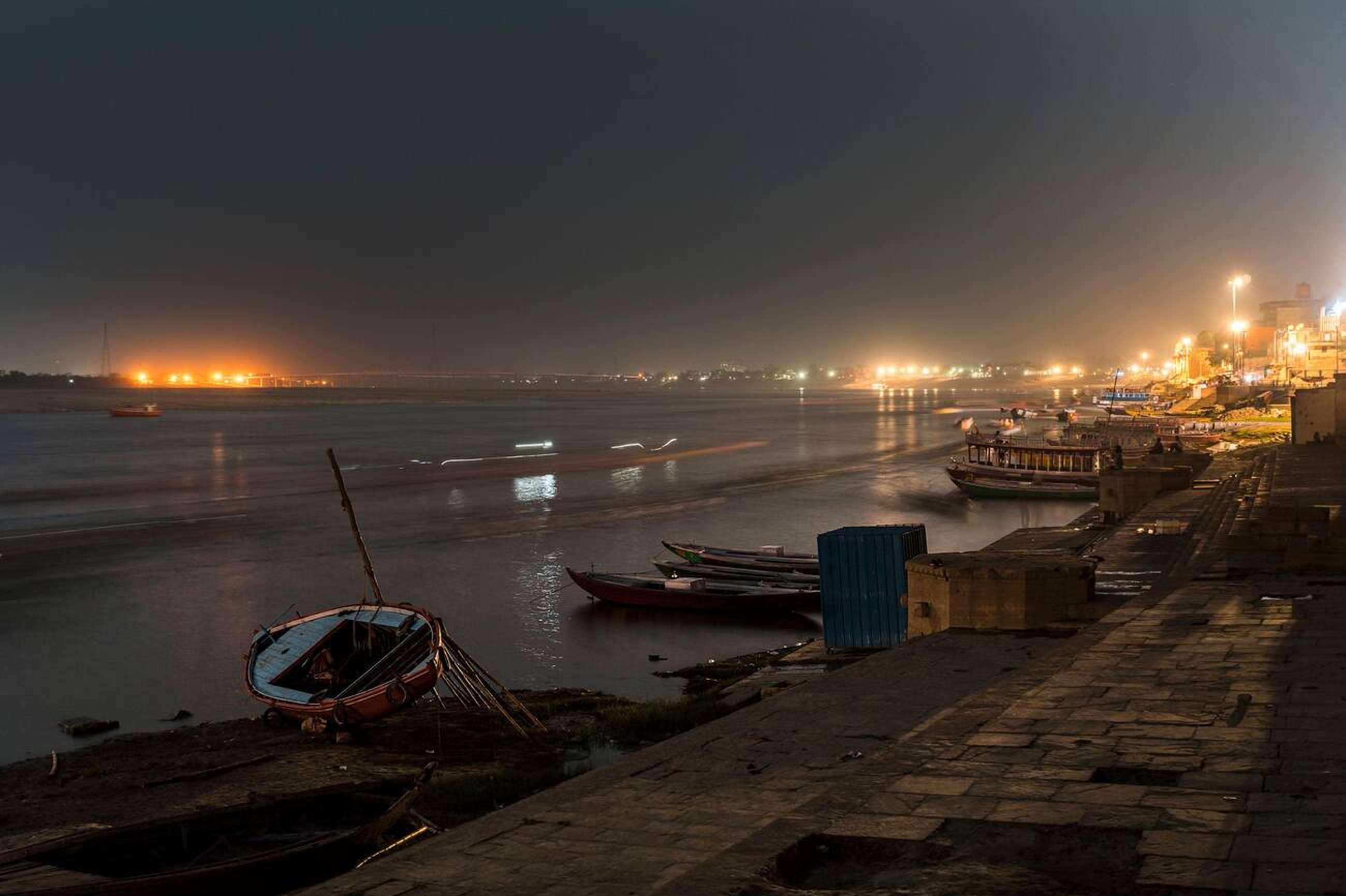 Experience the serene beauty of Varanasi by night on a walking tour