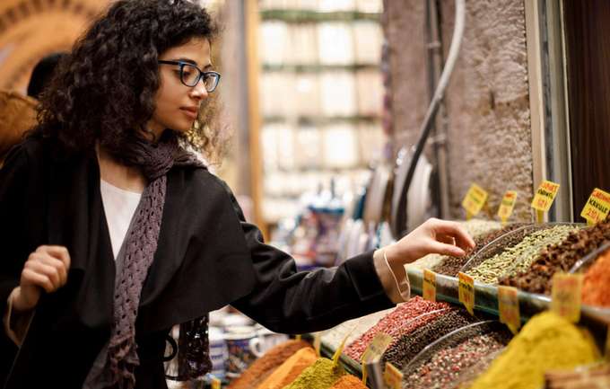 Explore the vibrant spice market in Varanasi and shop for rich, authentic spices