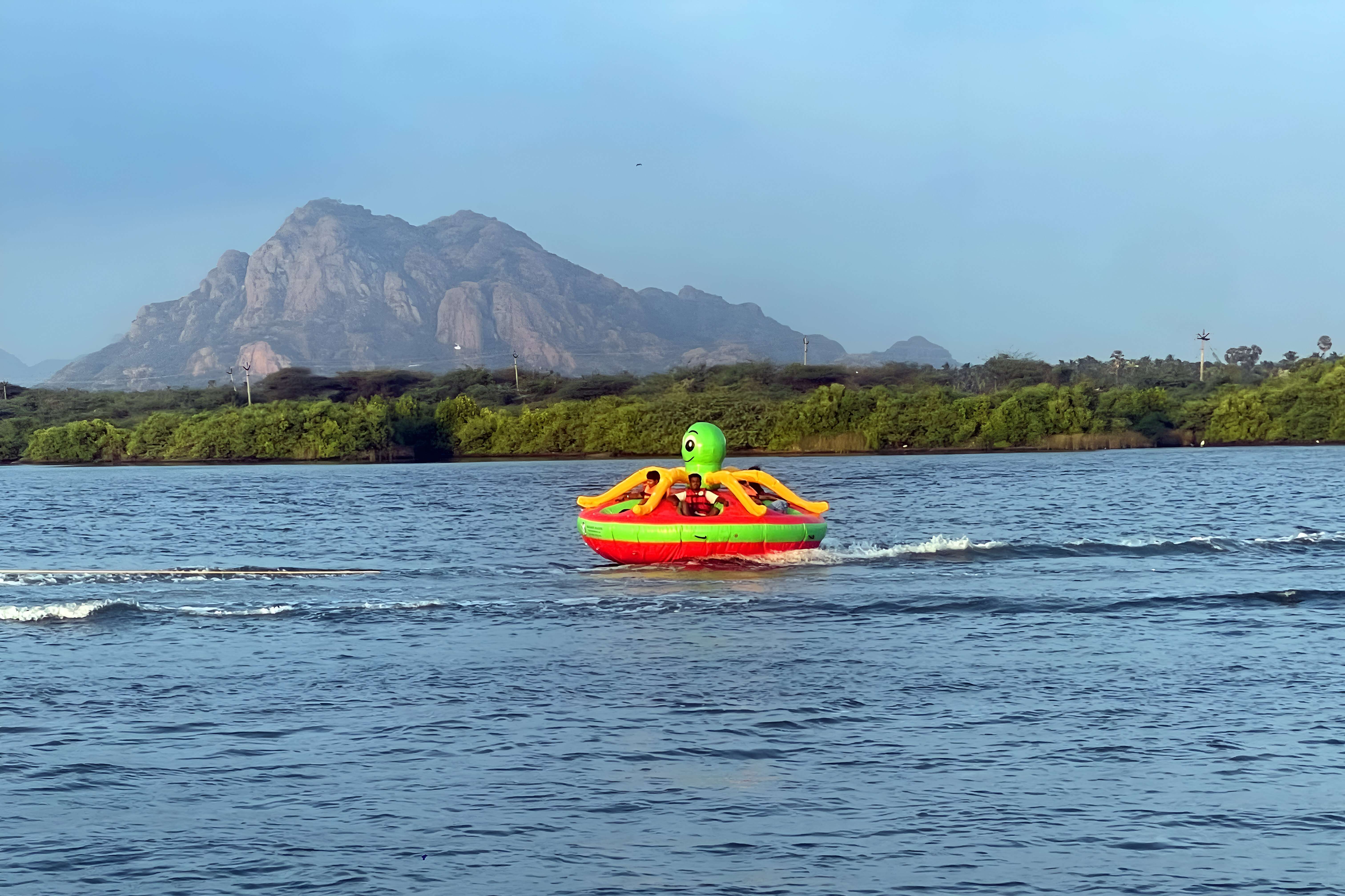 Feel like a sea creature riding the waves just off the shore