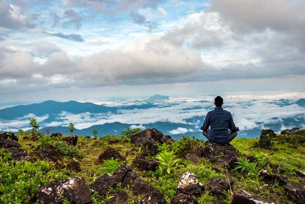 Tourist enjoying scenic view in Coorg