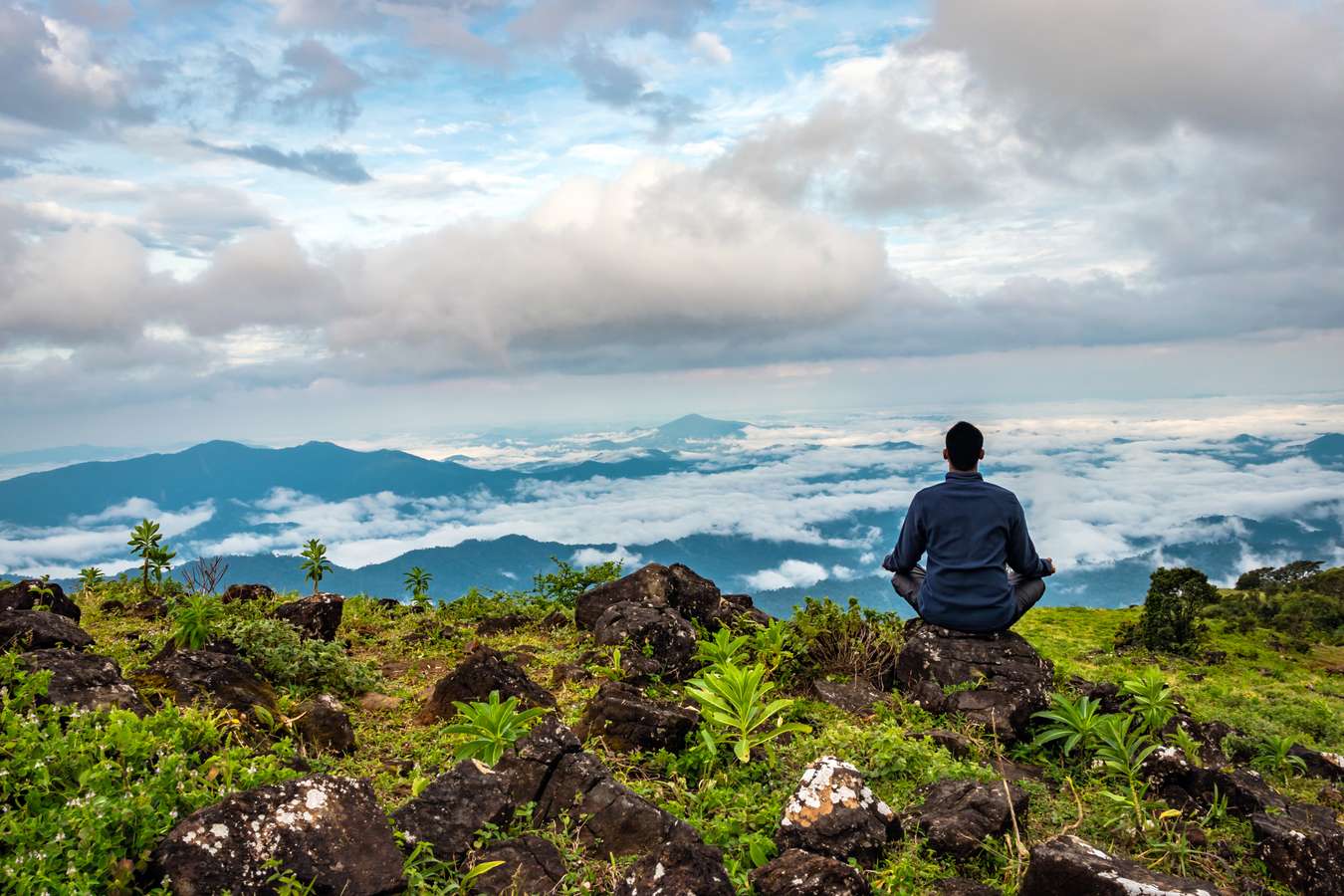 Tourist enjoying scenic view in Coorg