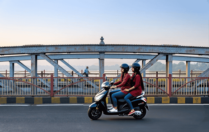 Glide effortlessly across Ellis Bridge admiring the stunning city views