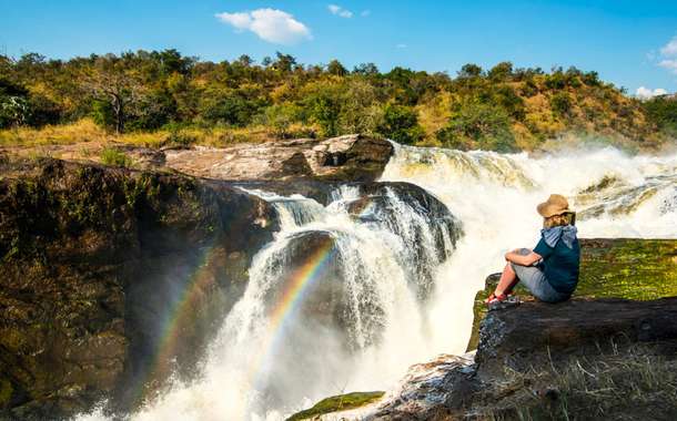 Tourist enjoying the view of stunning Murchison Falls
