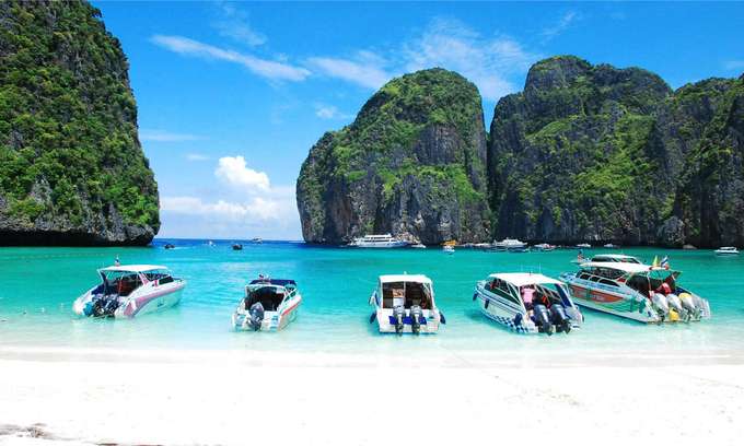 Enjoy a speed catamaran ride in Phi Phi Maya Bamboo Island