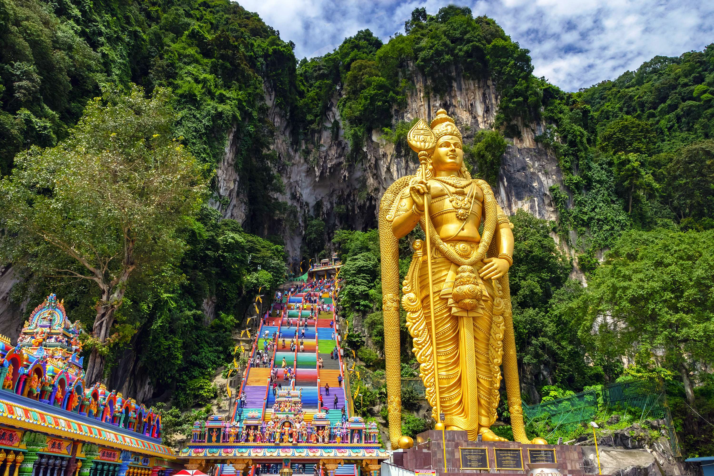 Batu caves towering 42.7 metre high statue of Lord Murugan