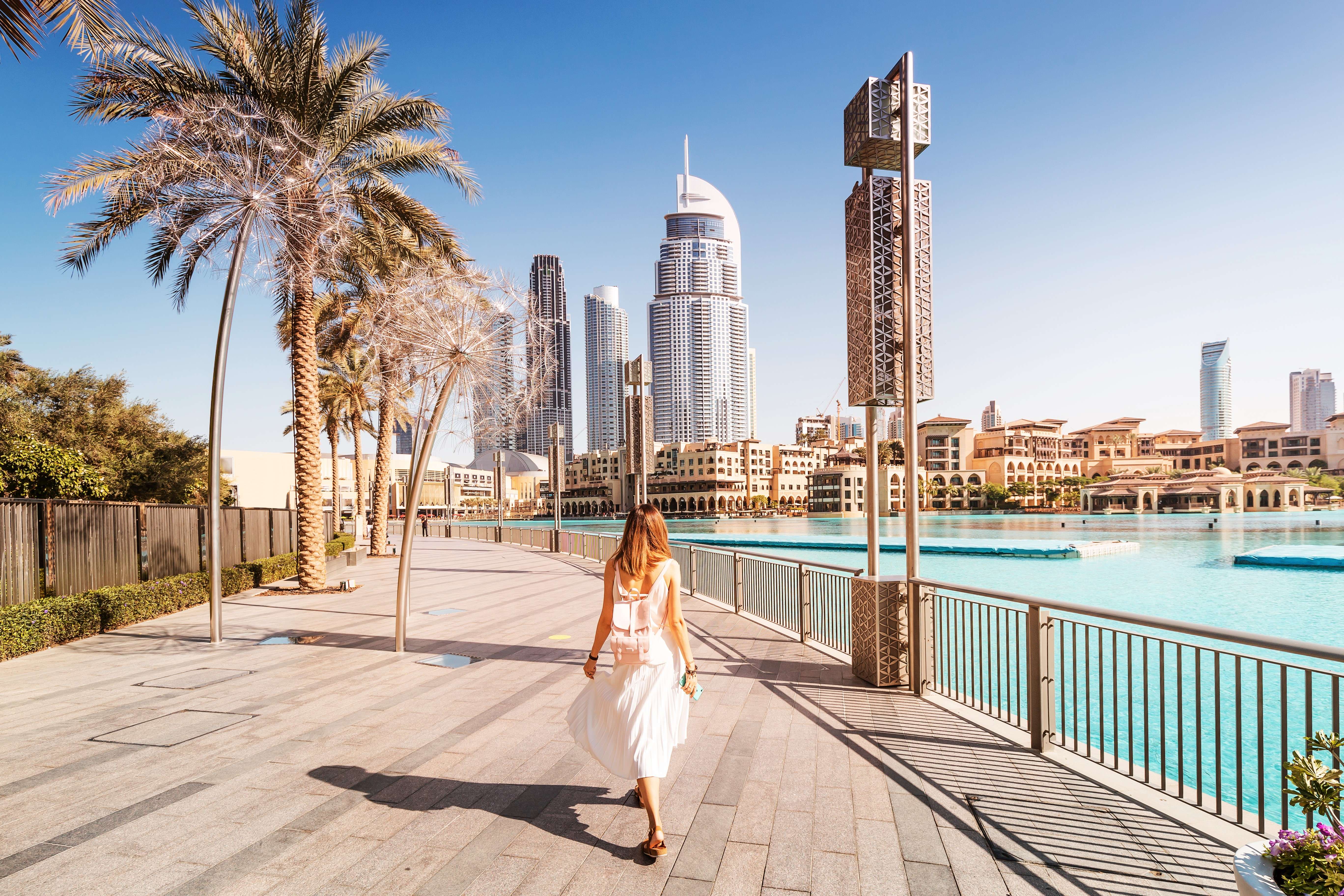 Girl enjoying the panoramic views of the Dubai City, Dubai