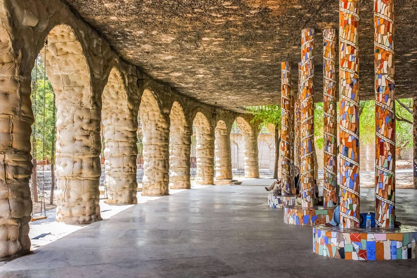 Explore Chandigarh's Rock Garden, a creative fusion of art, nature, and sculptures