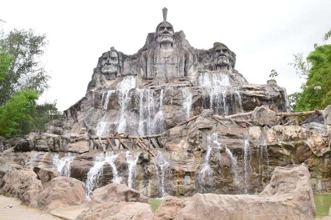 Admire the breathtaking cascade of water as it plunges into the serene surrounding