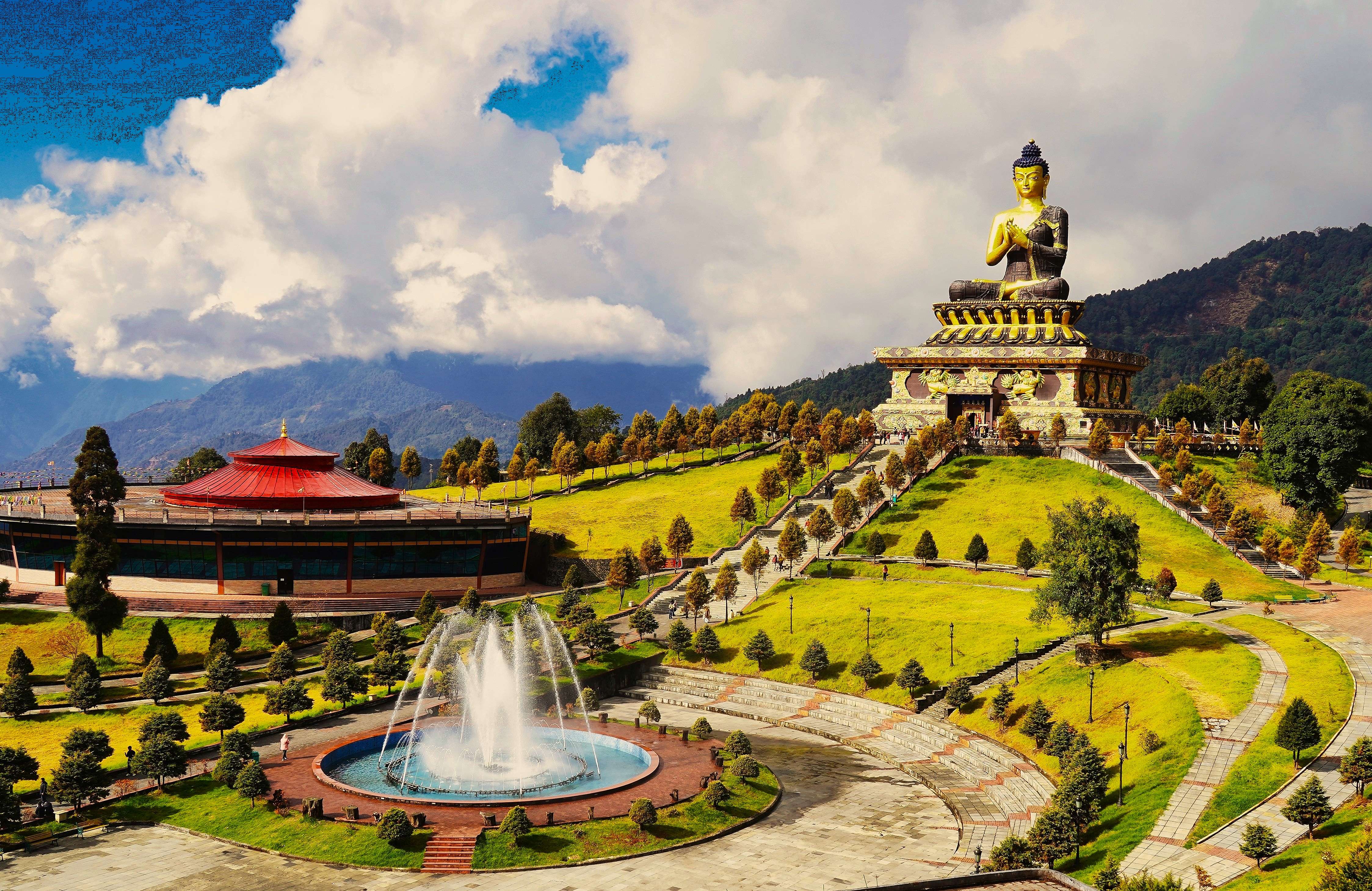 Marvel at the stunning Buddha statue of Ravangla, a 130-ft masterpiece framed by the Himalayas
