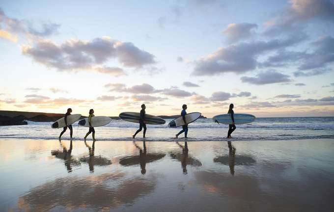 Start your surf journey in the scenic coastal town of Kovalam