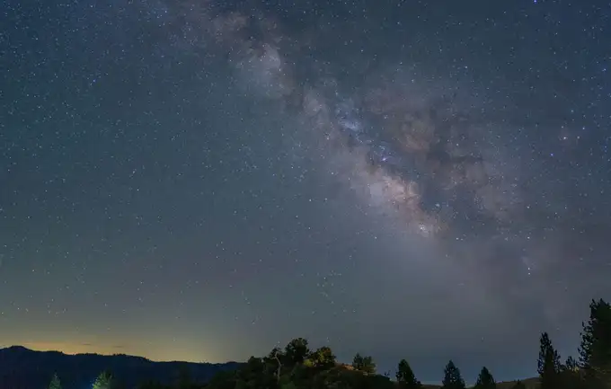 Feel the magic of the jungle night as wildlife sounds complement your stargazing