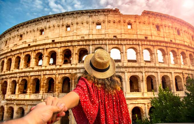 Admire the ancient Amphitheatre of Colosseum in Rome