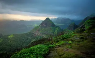 Admire the lush green valleys and hills of Mahabaleshwar, a hill station in Maharashtra
