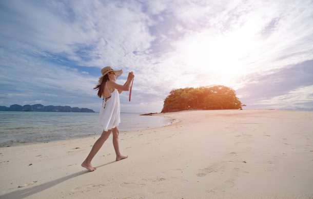 Woman wandering at a beach in Andaman