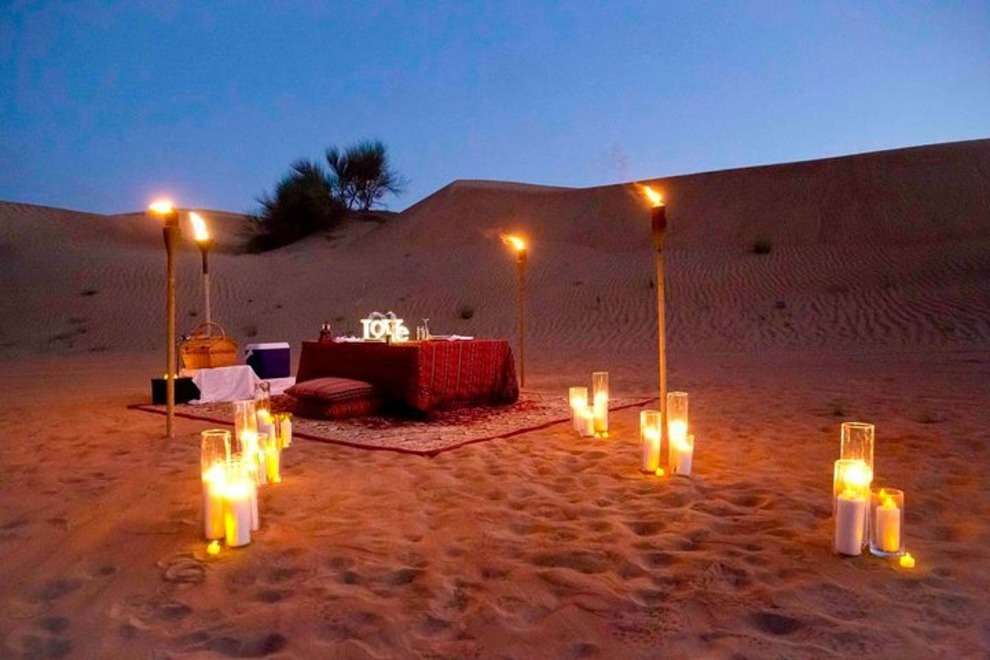 Create unforgettable memories with a cosy candlelight dinner on the dunes of Jaisalmer 