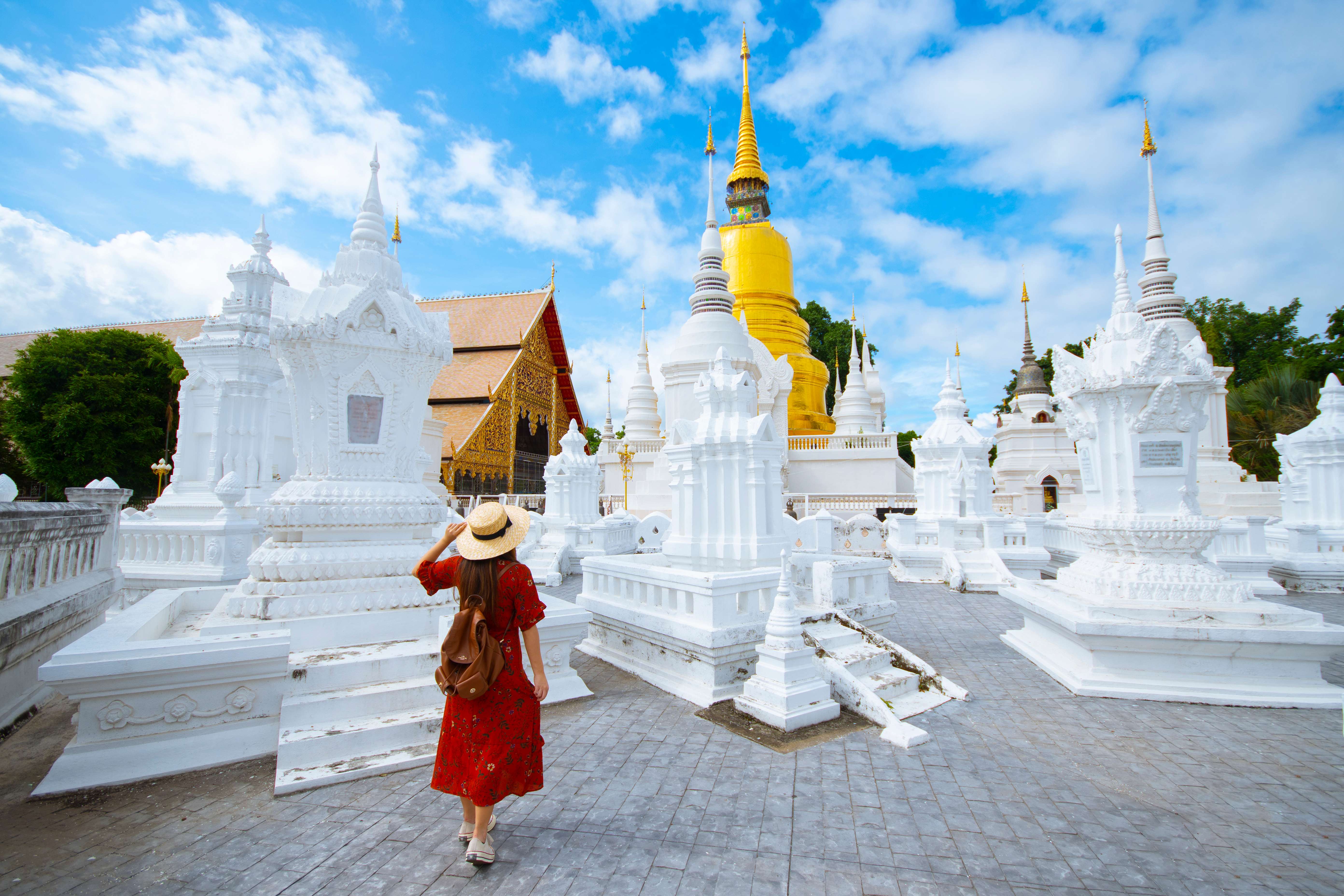 Enjoy the view of the golden stupa at Wat Suan Dok