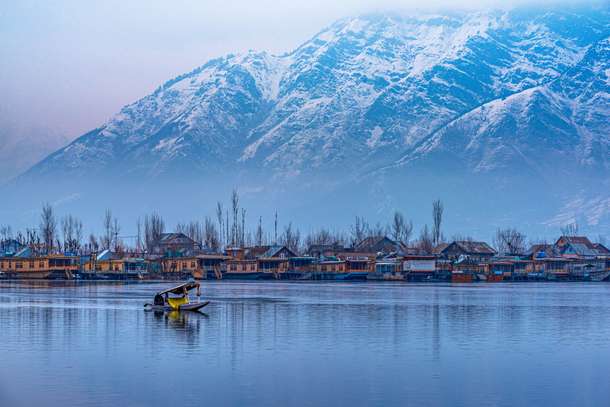 Soak in the beautiful view of Dal Lake and its iconic houseboats