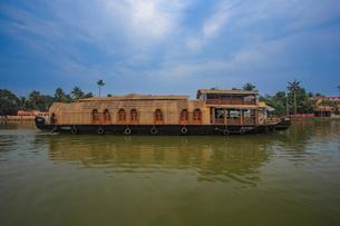 Explore the serene backwaters on a luxurious houseboat in Alleppey