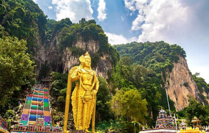 Witness the world's tallest statue at the Batu Caves