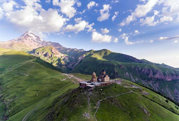 Ascend to Gergety Trinity Church, set 2,170 meters beneath Mount Kazbegi’s peak