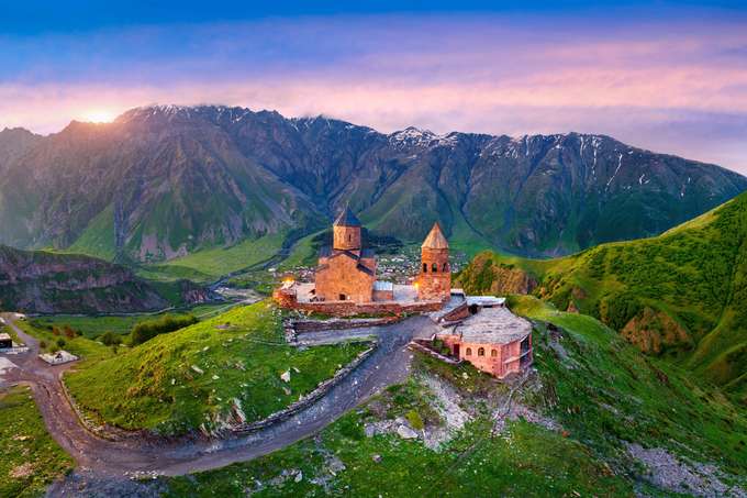 Stand in awe at Gergeti Trinity Church, perched 2,170m high