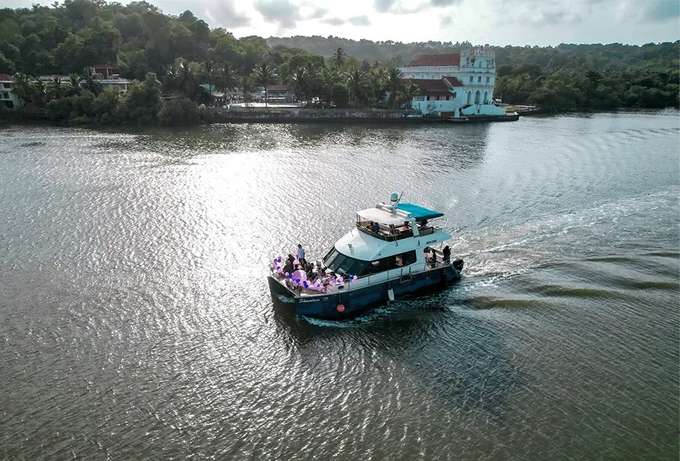 Set sail on the sea in a catamaran for 1-hour while taking in Goa's picturesque beauty