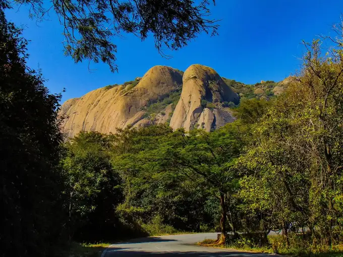 Challenge yourself with a steep ascent as you tackle Asia's largest monoliths on the Savandurga trek